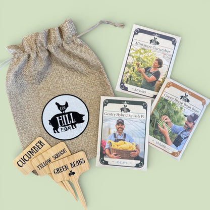 Set of garden seed packets and wooden markers with a branded drawstring bag on a light green background.